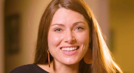 Female German teacher with welcoming smile