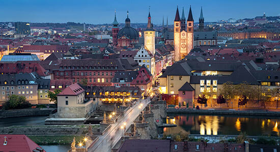 Aerial view of city buildings in Wurzburg, Germany at dusk.